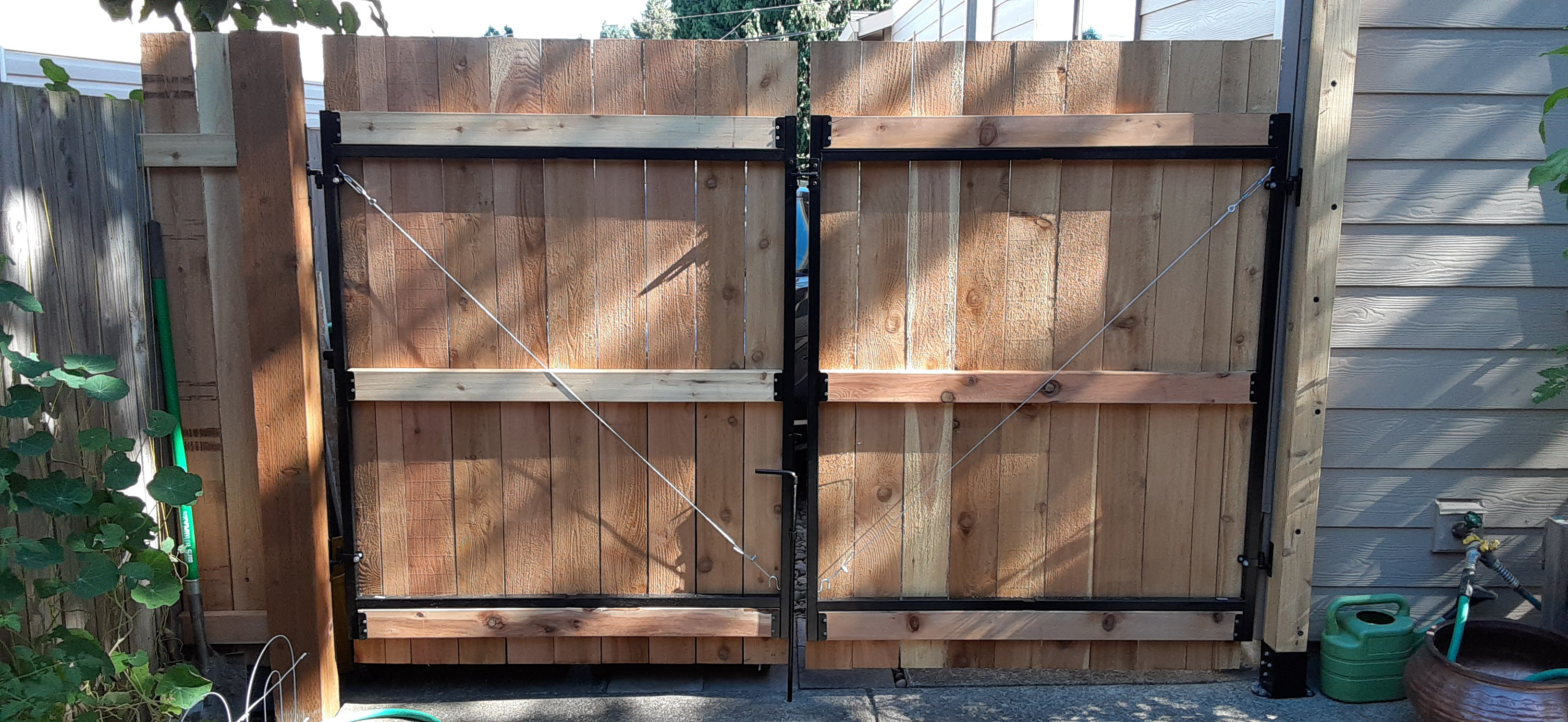 New custom built double door fence gate