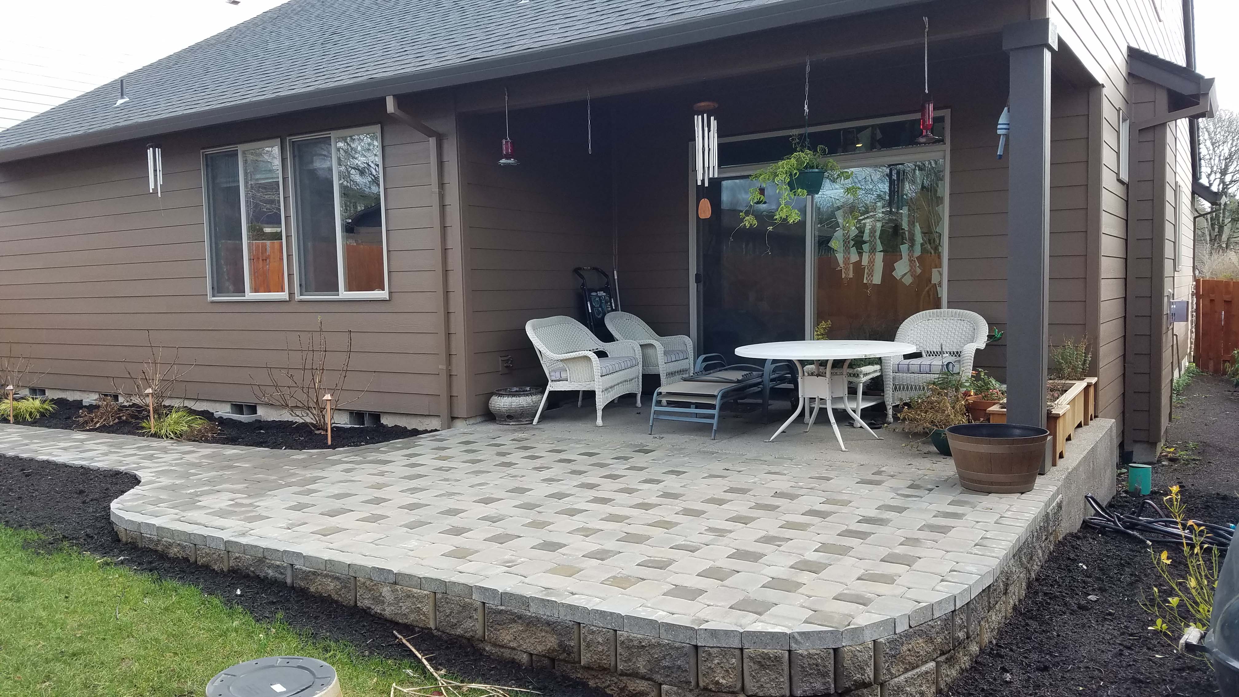 New back patio expansion with new brick path
