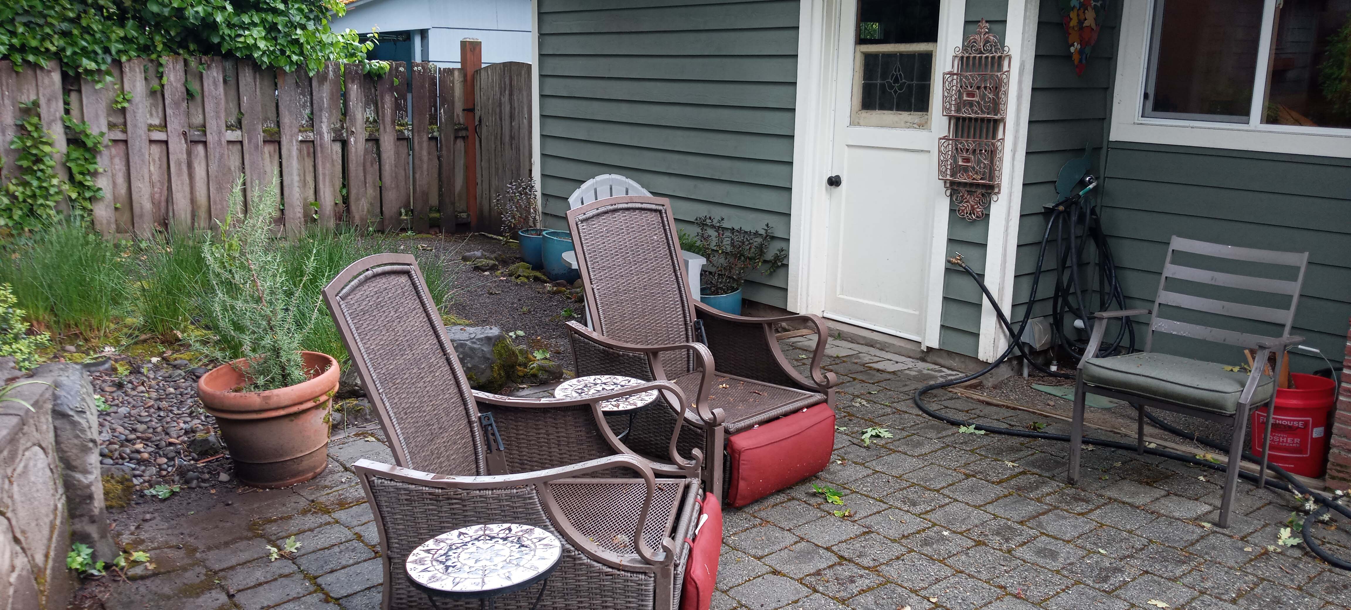 Simple backyard patio in need of remodeling